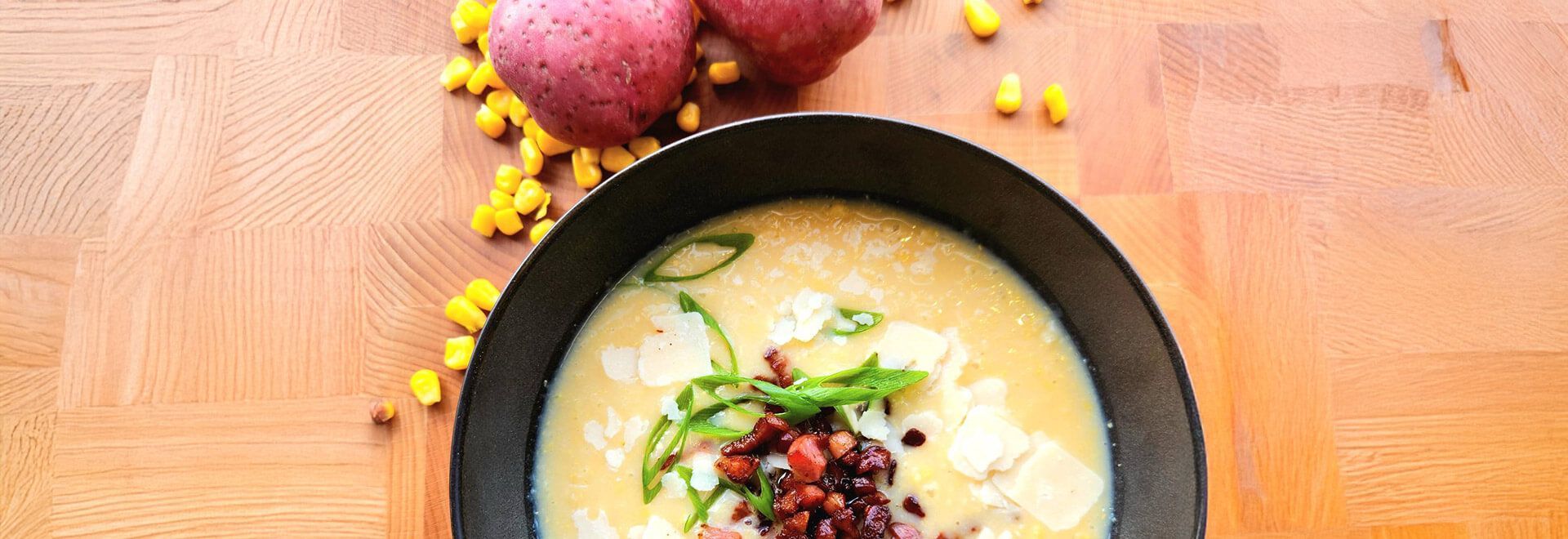 Cream of corn and potato soup with Parmesan and bacon